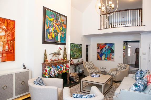 Color scheme designed to allow art to take center stage in this comfortable Bedford family Room.